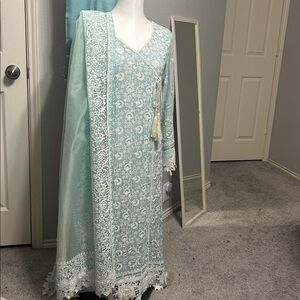 Shalwar kameez green white anarkali style with organza duppatta trousers.  S